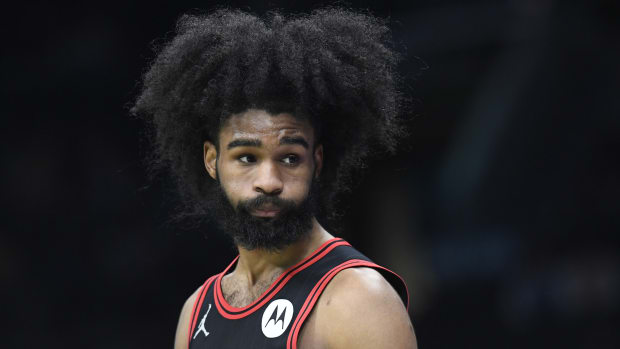 Chicago Bulls guard Coby White (0) in a time out during the second half against the Charlotte Hornets at the Spectrum Center.
